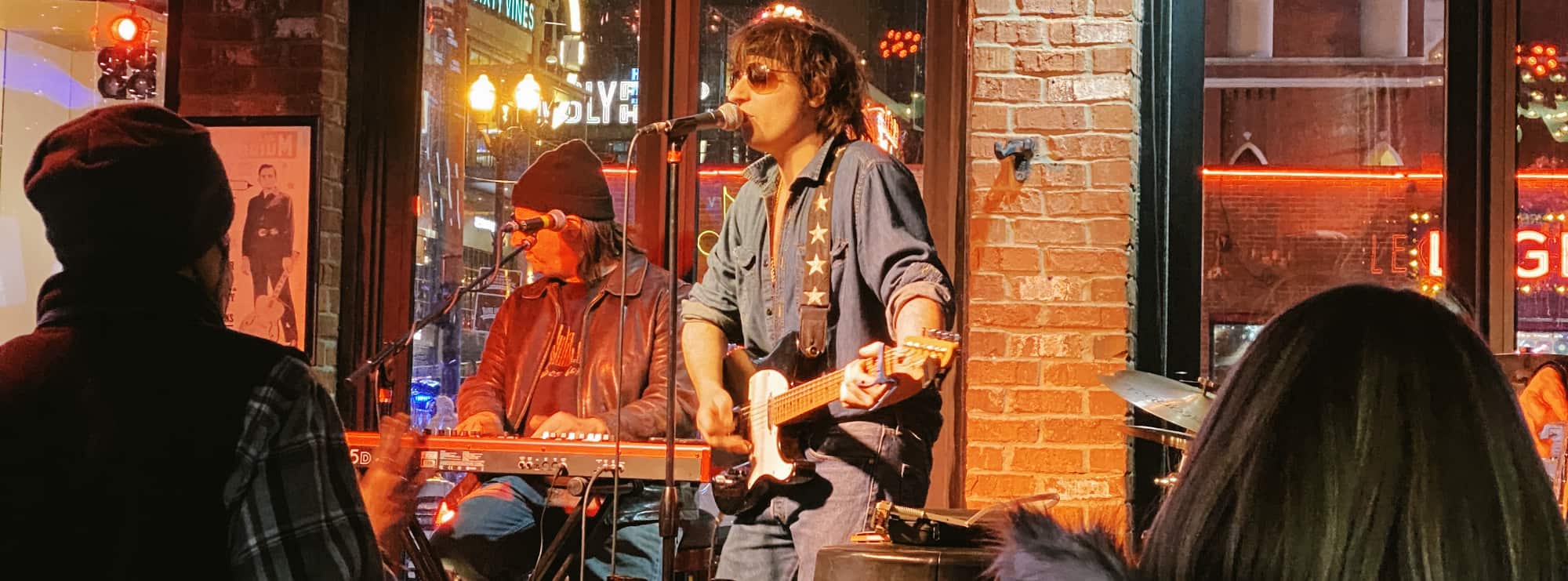 bar singer on guitar in Wichita