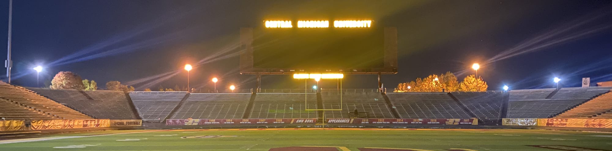 empty football stadium at night under the lights Wichita