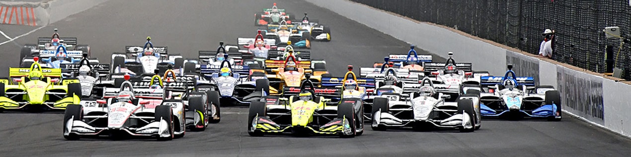 indy cars racing to through the start line Wichita